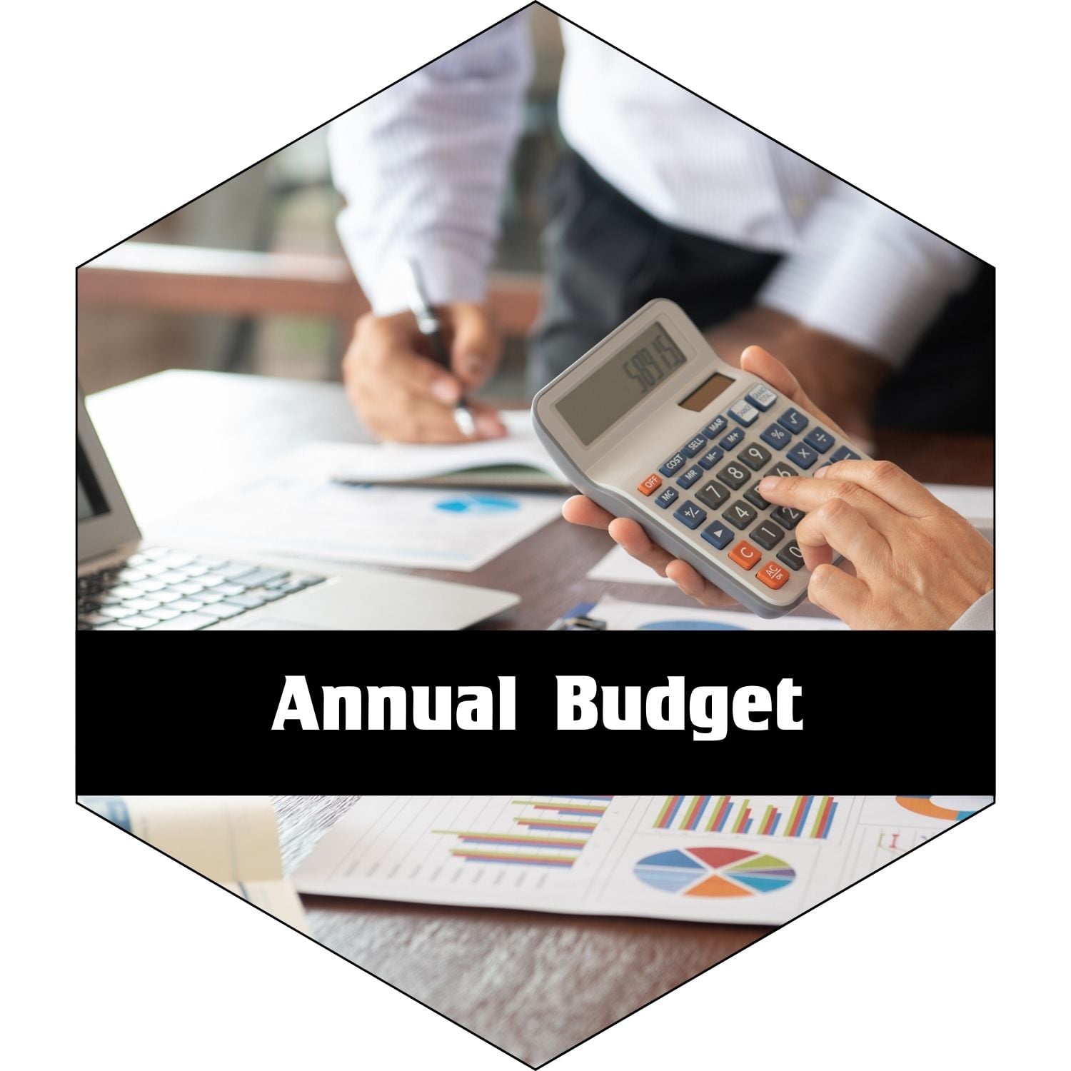 Annual Budget - Hands entering numbers in to calculator