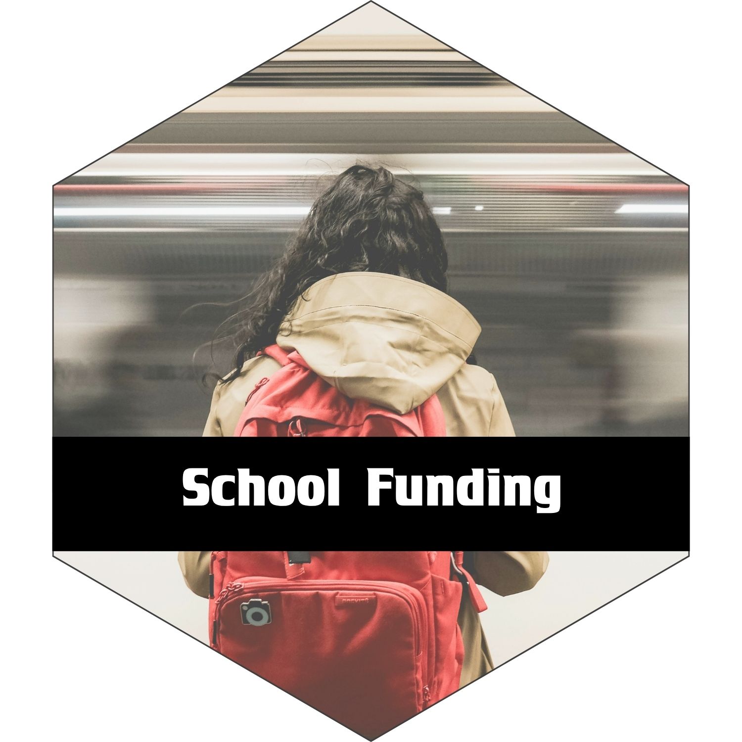 School Funding:  Girl with red backpack watching a train go by